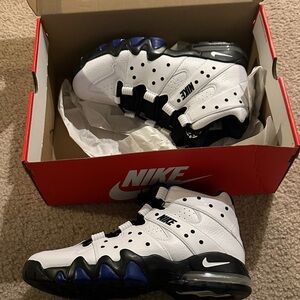Nike Kids White and Black Sneakers with Blue Accents